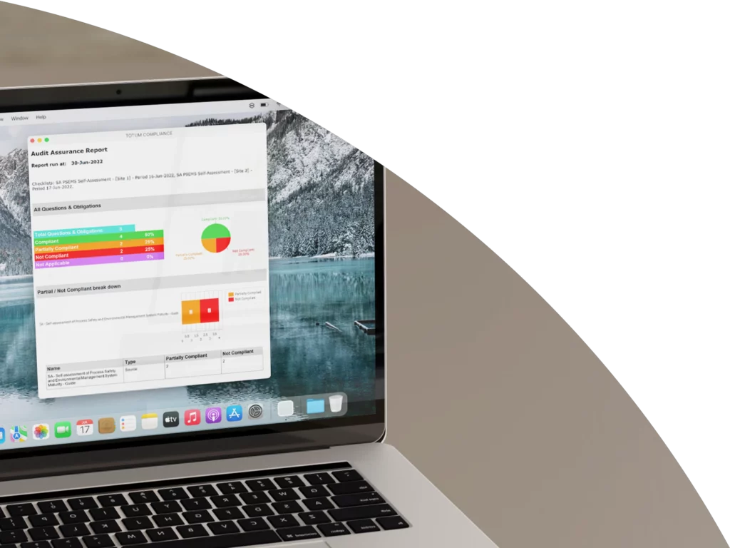 An audit assurance report automatically generated by Totum Compliance software displayed on a Macbook, including charts displaying information about obligation and compliance statuses.